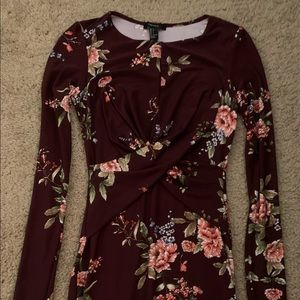 Maroon dress flower detailing cross in the front long sleeve stretch material